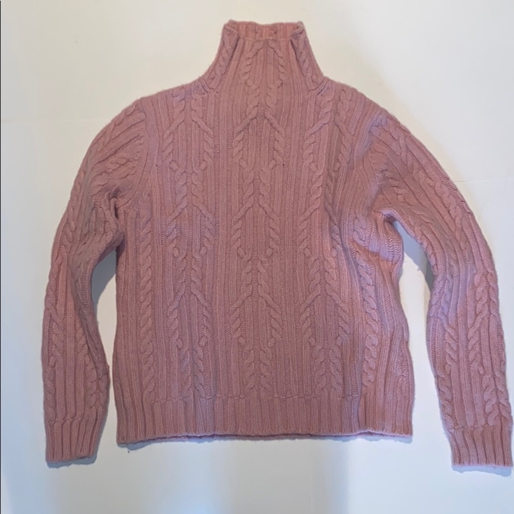 Pink women’s turtle neck sweater